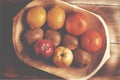 Assortment fresh healthy fruits in handmade wooden bowl made in Royalty Free Stock Photo