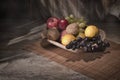 Assortment fresh healthy fruits in handmade wooden bowl made in Royalty Free Stock Photo