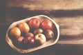 Assortment fresh healthy fruits in handmade wooden bowl made in Royalty Free Stock Photo