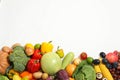 Assortment of fresh organic fruits and vegetables on white background, top view Royalty Free Stock Photo