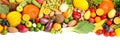 Assortment of fresh organic fruits and vegetables on white background, top view. Banner design Royalty Free Stock Photo