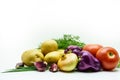 Assortment of fresh raw vegetables on white background. Selection includes potato, tomato, green onion, pepper, garlic and dill Royalty Free Stock Photo