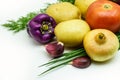 Assortment of fresh raw vegetables on white background. Selection includes potato, tomato, green onion, pepper, garlic Royalty Free Stock Photo