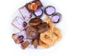 Assortment of freshly prepared organic oriental sweets - cream cakes, Tatar baklava on a white plate. View from above. Royalty Free Stock Photo