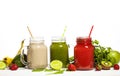 Assortment of fruit and vegetable smoothies in glass jars with straws Royalty Free Stock Photo