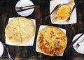 Assortment of georgian food, khachapuri. Top view on traditional georgian bakery, various pies with cheese on wooden table