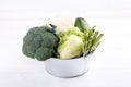 Assortment green vegetables on white table.  Broccoli, cauliflower, brussels sprouts, kohlrabi, avocado, asparagus. Healthy eating Royalty Free Stock Photo