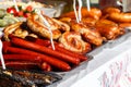 Assortment of grilled sausages for sale. Street food, fast food Royalty Free Stock Photo