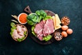 Assortment of healthy protein source and body building foods. Meat, chicken fillet, broccoli, beans, cheese, eggs, wheat. Royalty Free Stock Photo