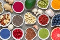 Assortment of healthy vegan food on a gray background. superfood. top view Royalty Free Stock Photo