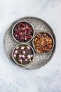 Assortment of herbal and fruit tea in metal bowls Royalty Free Stock Photo