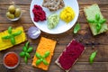 Assortment of hummus appetizer, tasty arabic snack on wooden rustic table. Traditional arabic and Israeli dish