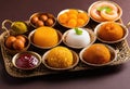 An assortment of Indian sweets like ladoo- jalebi- and gulab jamun