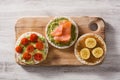 Assortment of ingredients on puffed rice cakes Royalty Free Stock Photo