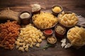 assortment of italian pasta shapes on rustic table