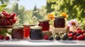 assortment of jams, seasonal berries, plums, mint and fruits Royalty Free Stock Photo