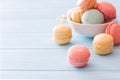 Assortment of macarons on blue wood background