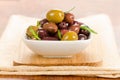 Assortment of marinated olives in a small bowl Royalty Free Stock Photo