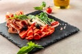 Assortment meat appetizer, prosciutto, salami and ham, Restaurant menu, dieting, cookbook recipe top view