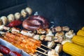 Assortment of meat and vegetables roasting on the barbacue