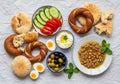 An assortment of Middle Eastern breakfast items is arranged on a crumpled white surface. There are Royalty Free Stock Photo