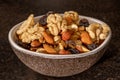 Assortment of mixed nuts and dried fruits for a healthy snack, close-up view Royalty Free Stock Photo