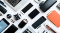 Assortment of modern electronic devices and accessories on white surface Royalty Free Stock Photo