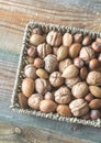 Assortment of nuts in the basket Royalty Free Stock Photo