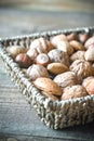 Assortment of nuts in the basket Royalty Free Stock Photo