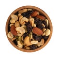 Assortment of nuts and dried fruit in a wood bowl isolated on a white background top view Royalty Free Stock Photo