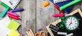 Assortment of office and school supplies on wooden table Royalty Free Stock Photo