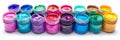 Assortment of open paint cans on a colorful and vibrant background with multiple hues