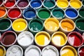 assortment of paint buckets with faux paint