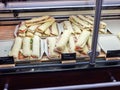 Assortment of paninis / sandwiches ready for cooking Royalty Free Stock Photo