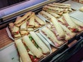 Assortment of paninis / sandwiches ready for cooking Royalty Free Stock Photo