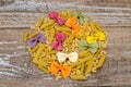 Assortment of pasta on the wooden background Royalty Free Stock Photo