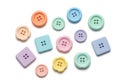 Assortment of pastel colored buttons isolated on white background Royalty Free Stock Photo