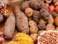 Assortment of Peruvian potatoes, corn, and yucca