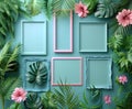 A collection of empty pink and blue picture frames arranged in a creative flat lay among vibrant tropical leaves. Royalty Free Stock Photo