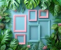 A collection of empty pink and blue picture frames arranged in a creative flat lay among vibrant tropical leaves. Royalty Free Stock Photo