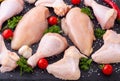 Assortment of raw chicken  breast  fillet  , wings and legs  with spices and herbs Royalty Free Stock Photo