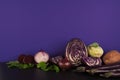 Assortment of raw organic violet vegetables.