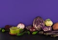 Assortment of raw organic violet vegetables.