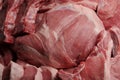 Assortment of raw pork meat: tenderloin, shoulder, neck on a paper background. Close-up Royalty Free Stock Photo