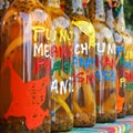 Assortment of rhum bottles at the market, squared format Royalty Free Stock Photo