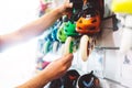 Assortment roller skates isolated in store shop, person choosing and buy color roller-skates on backgraund sun flare Royalty Free Stock Photo