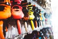 Assortment roller skates isolated in store shop, person choosing and buy color roller-skates on backgraund sun flare, healthy Royalty Free Stock Photo