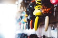Assortment roller skates in store shop, person choosing and buy color roller-skates on backgraund sun flare, healthy