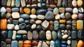 Assortment of semi precious stones ordered for sale. Top view of a neatly organized stones storage box