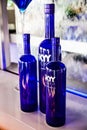 Assortment of Skyy Vodka bottles displayed on a white surface Royalty Free Stock Photo